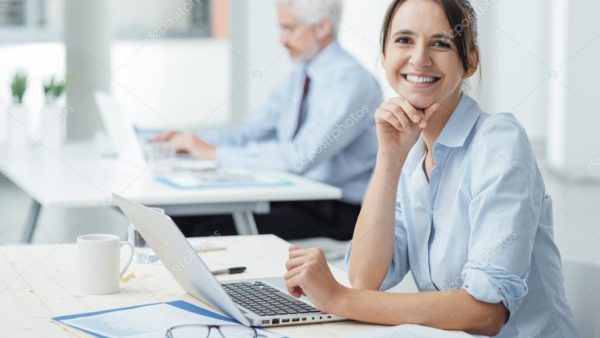 depositphotos_78289332-stock-photo-smiling-business-woman-at-work